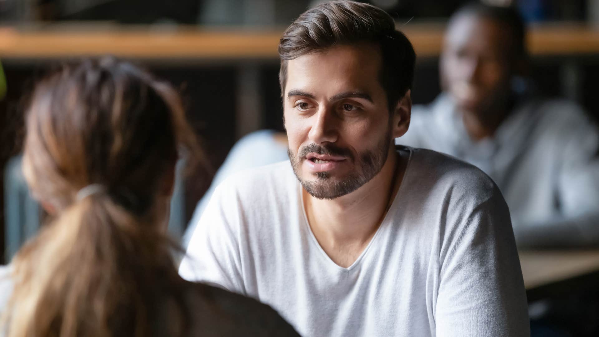 husband speaking to wife in public
