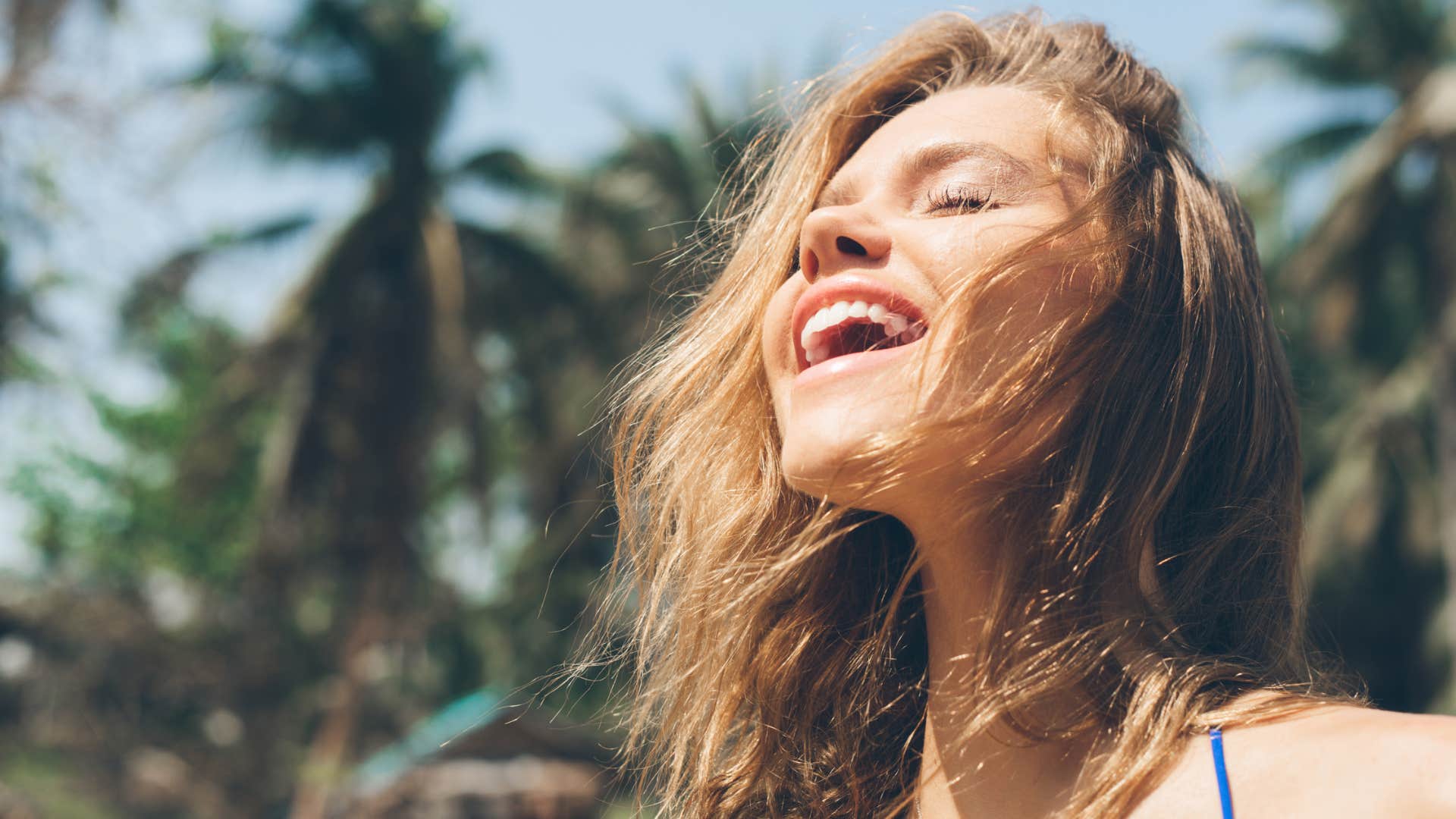happy woman embracing her courage