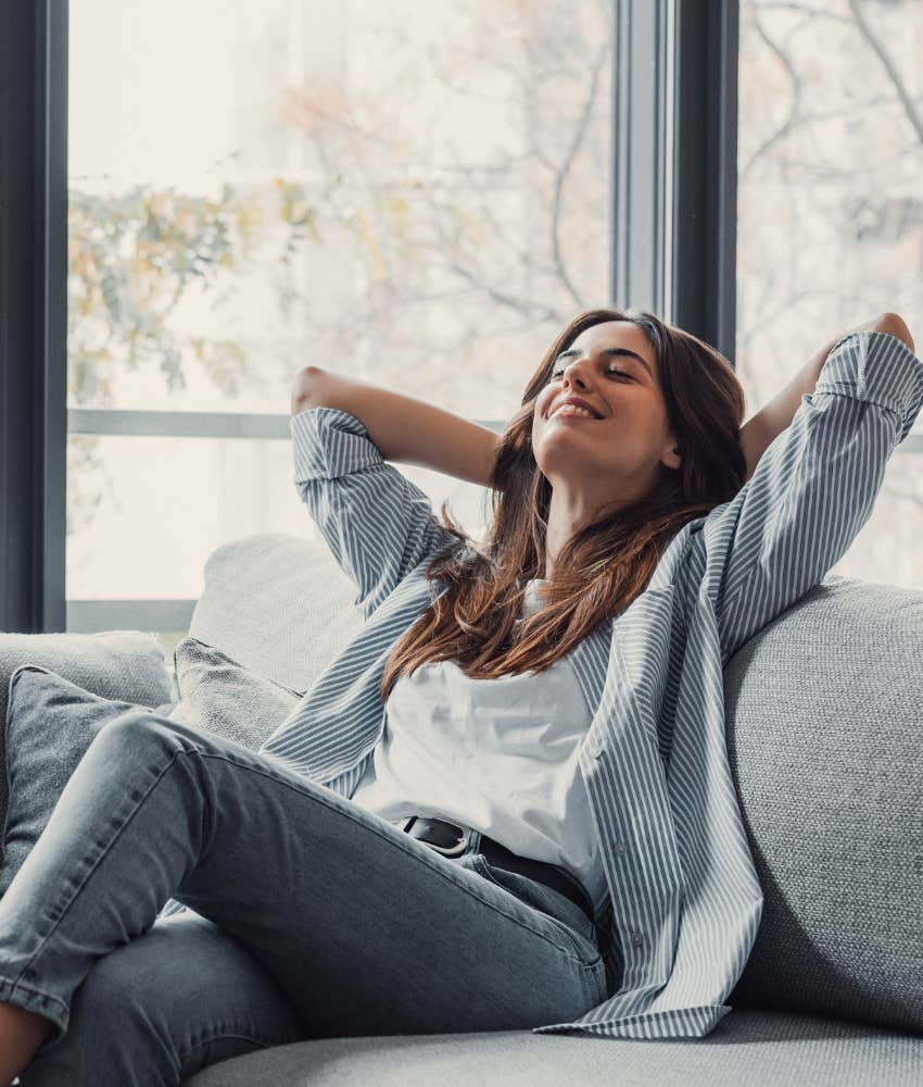 Woman is happy and relaxed.