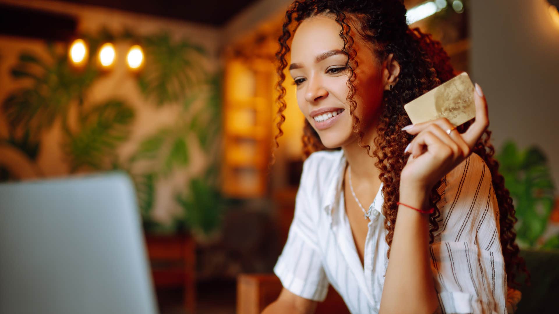 wealthy woman living within her means shopping online