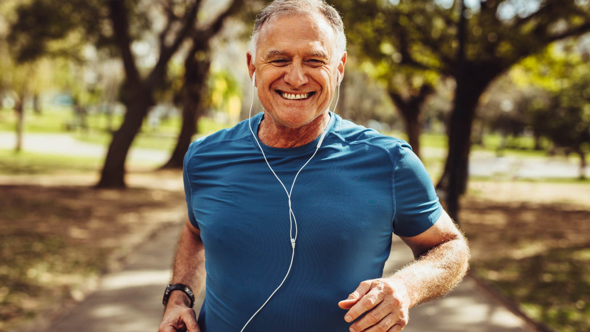 man with self-discipline running outside