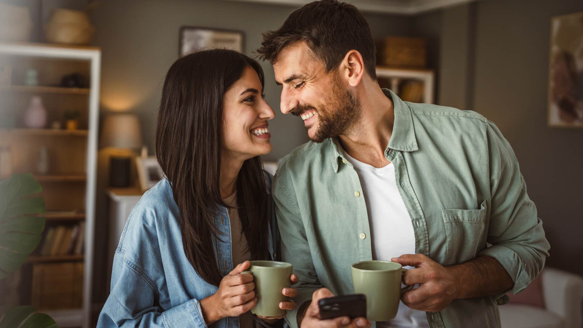 couple practicing gratitude and smiling at each other