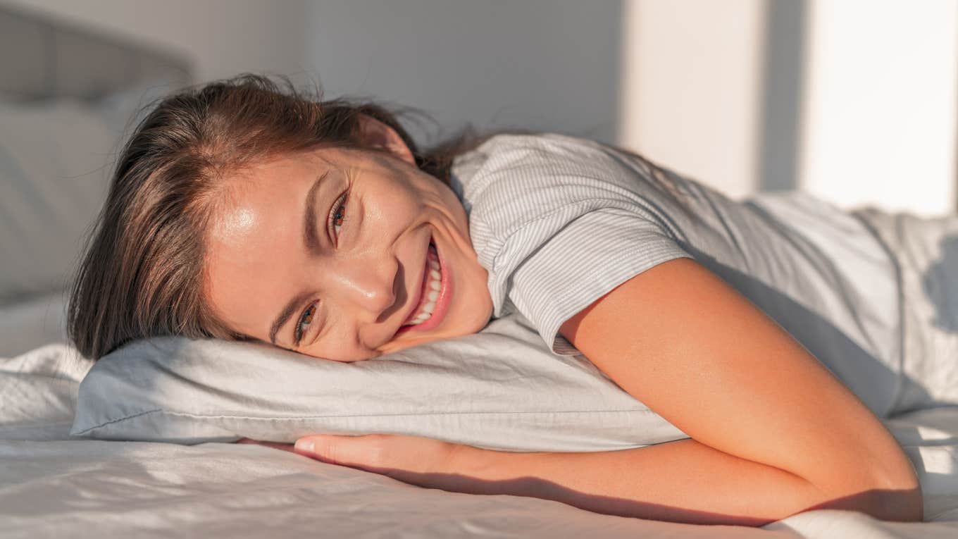 Little Things Frugal People Do Every Morning That Quietly Save Them Money frugal woman waking up to start her morning routine