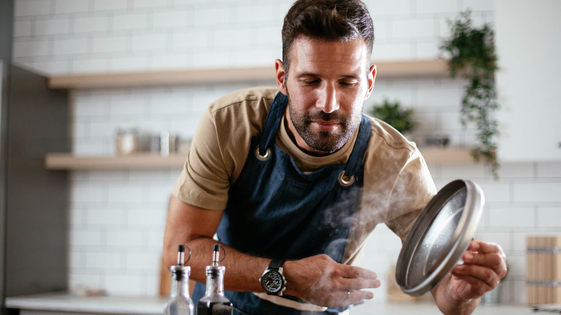 man cooking in his kitchen