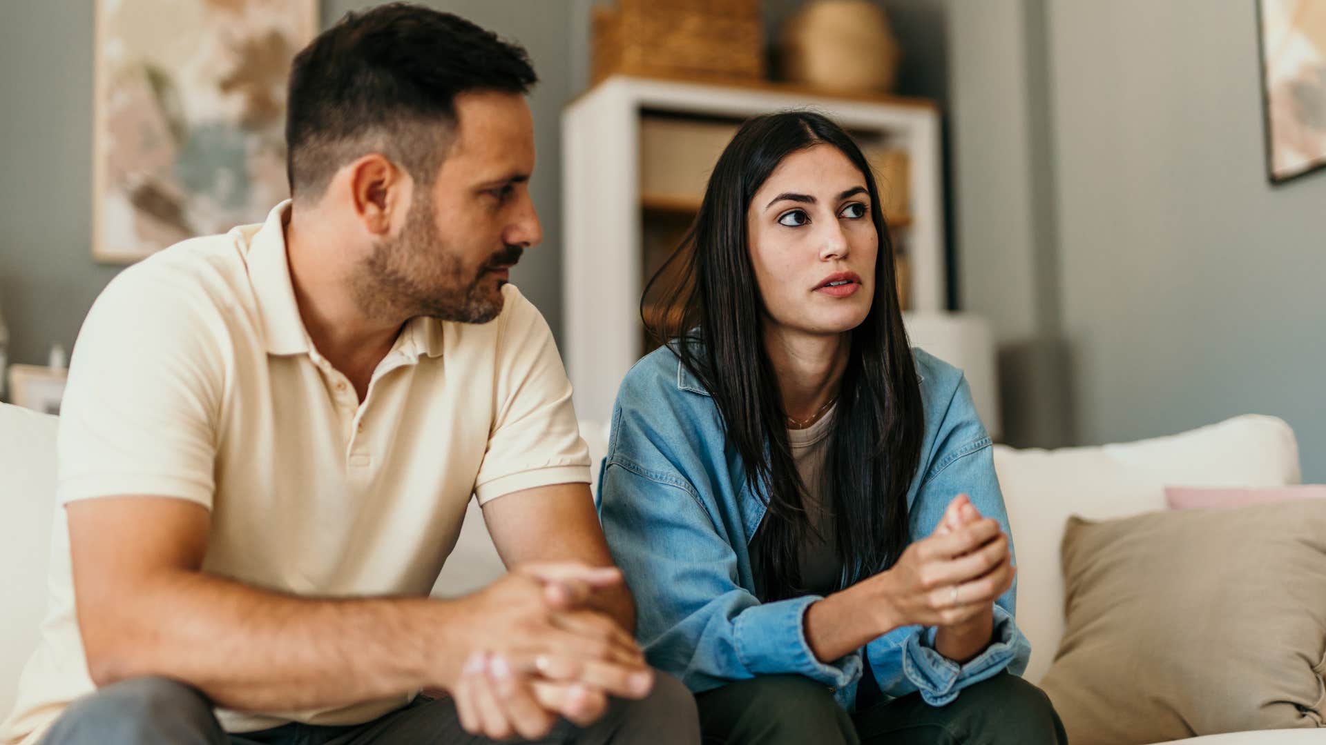 woman questioning social norms next to her upset traditional partner
