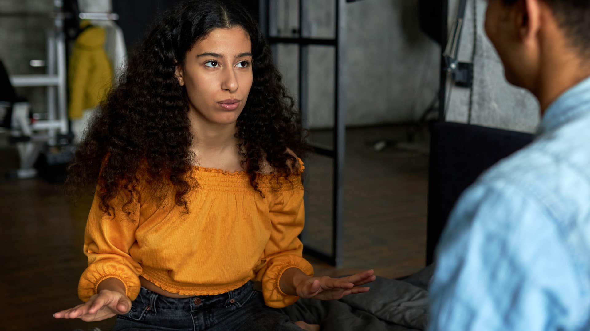 woman saying no to going out talking to her friend