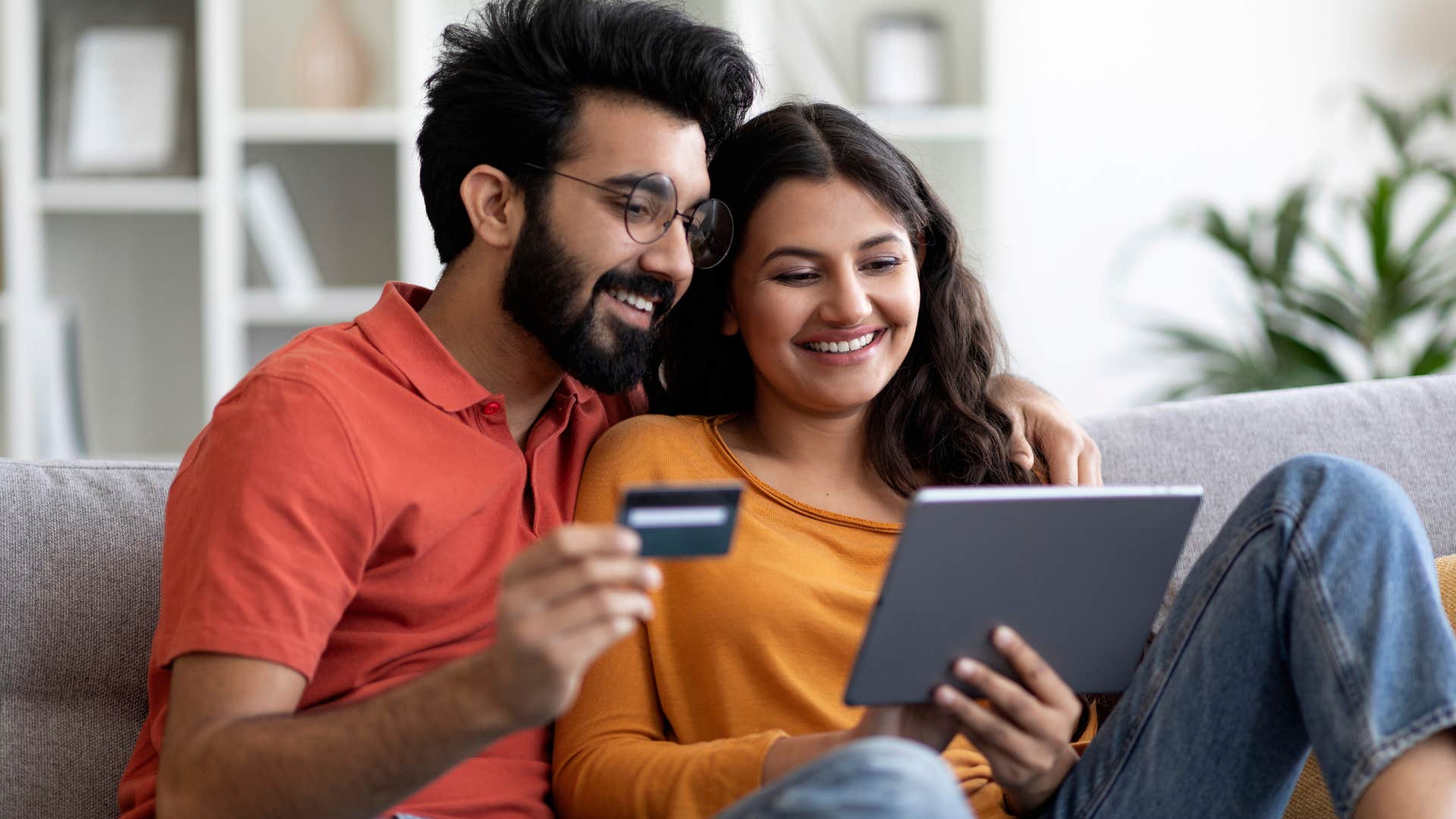 couple buying something because they have the money