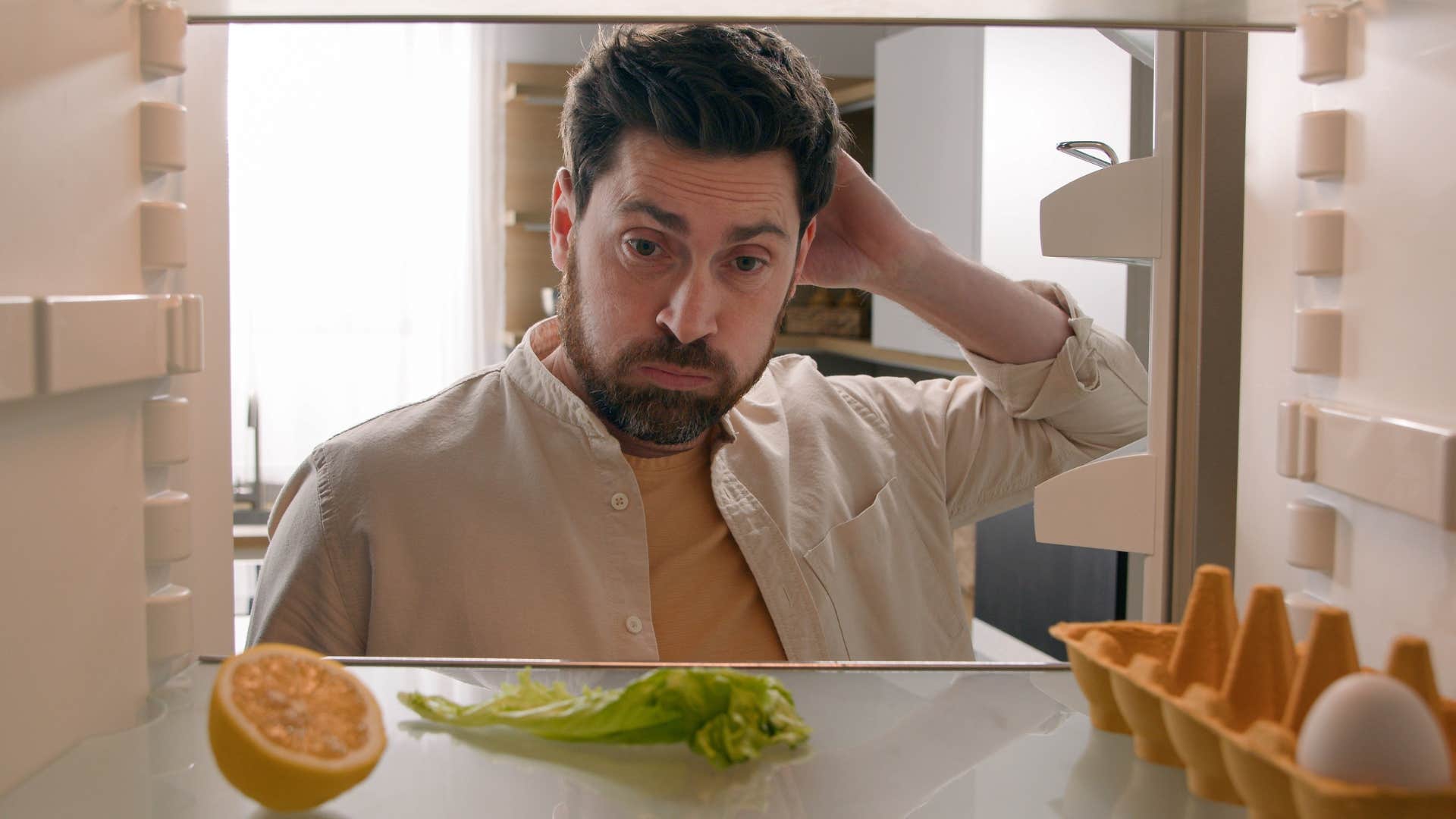 a burned out father sees his empty fridge