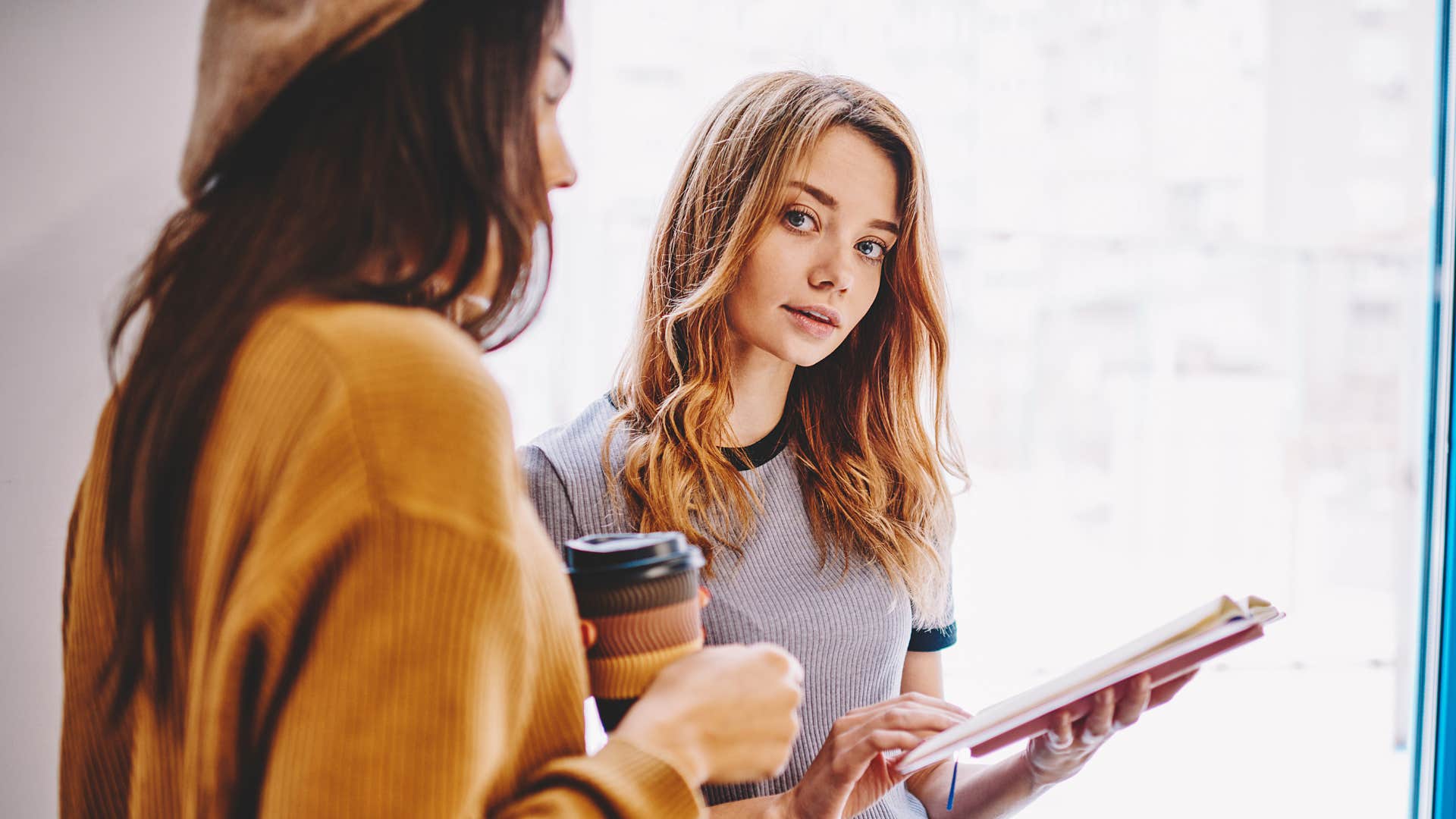 a woman notices that her burned out friend has not read her book fully