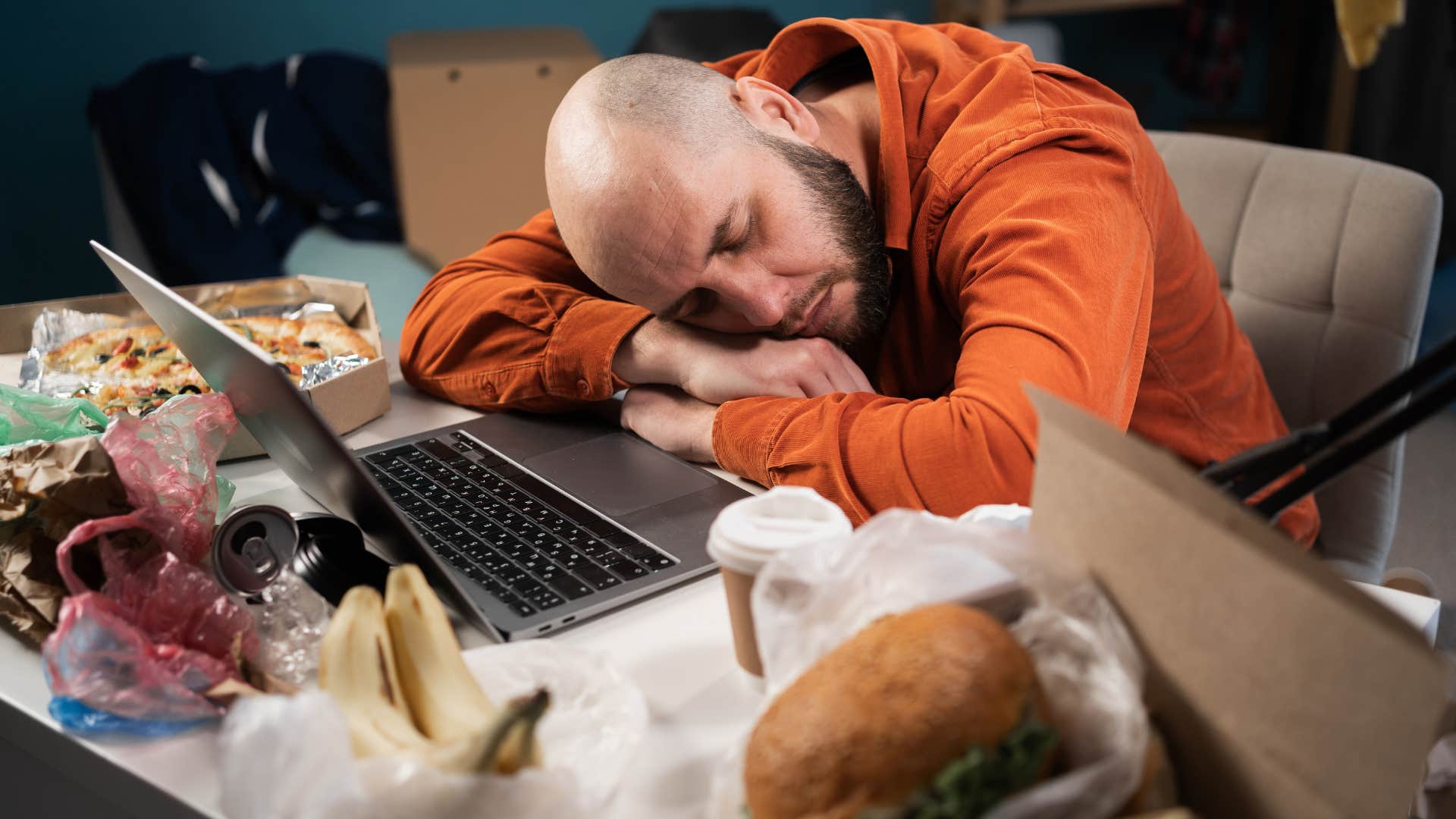 a burned out man has neglected his personal space that is full of clutter