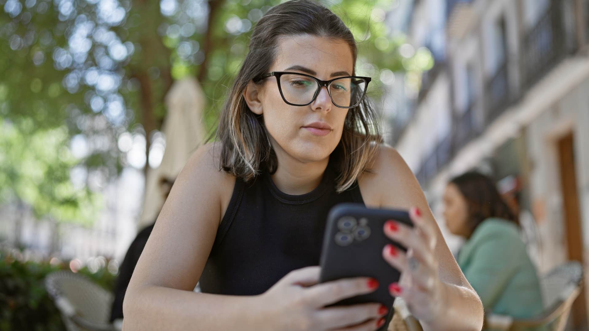 woman texting no to plans that involve driving