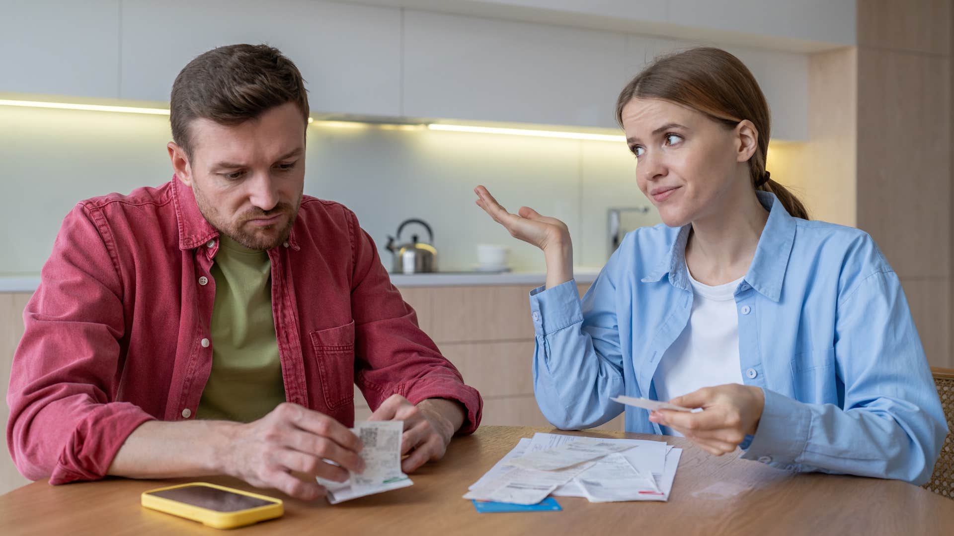 Man whose conversations are superficial sitting next to his wife.