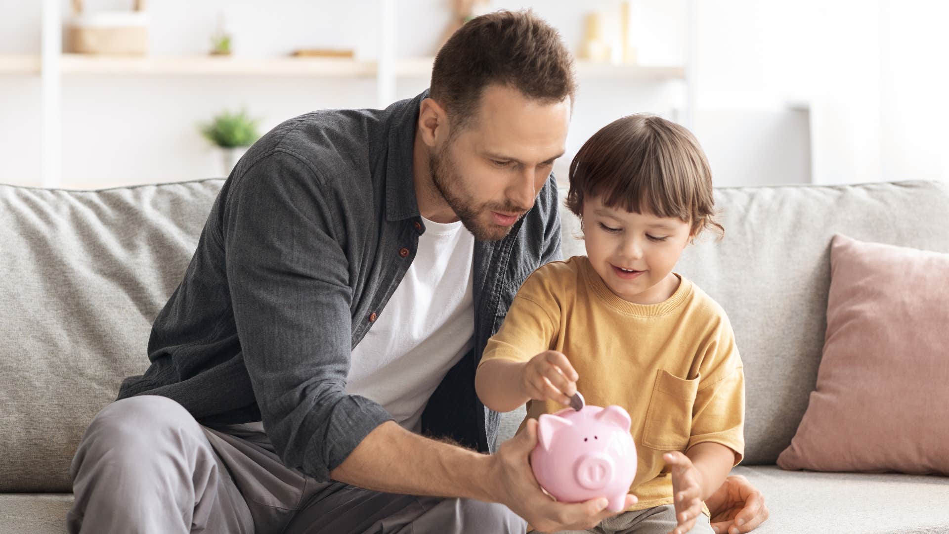 dad who is making savings a priority for his son