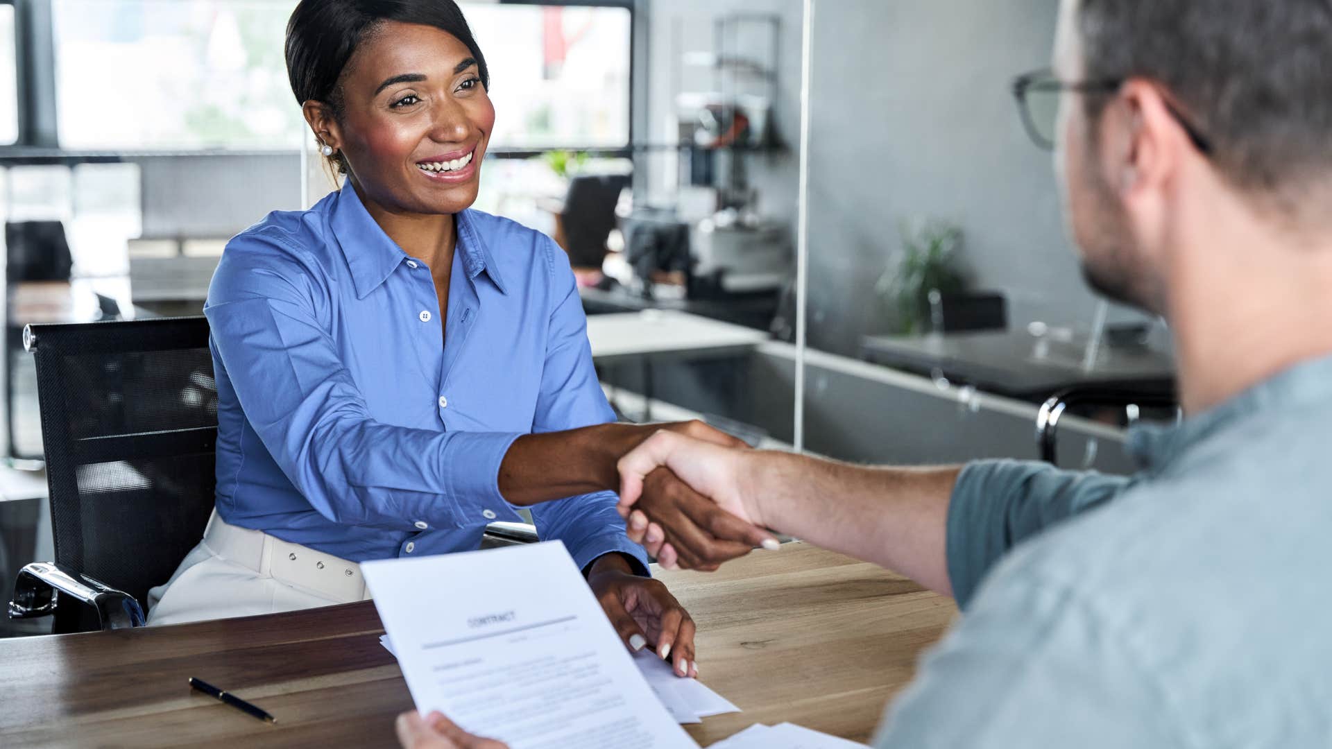woman who is trying to move up the corporate ladder