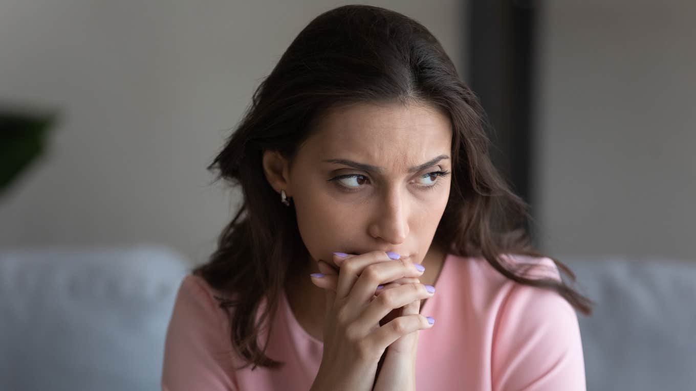 mom asks if boyfriend’s request to charge her 17-year-old son rent is a red flag Woman looks stressed