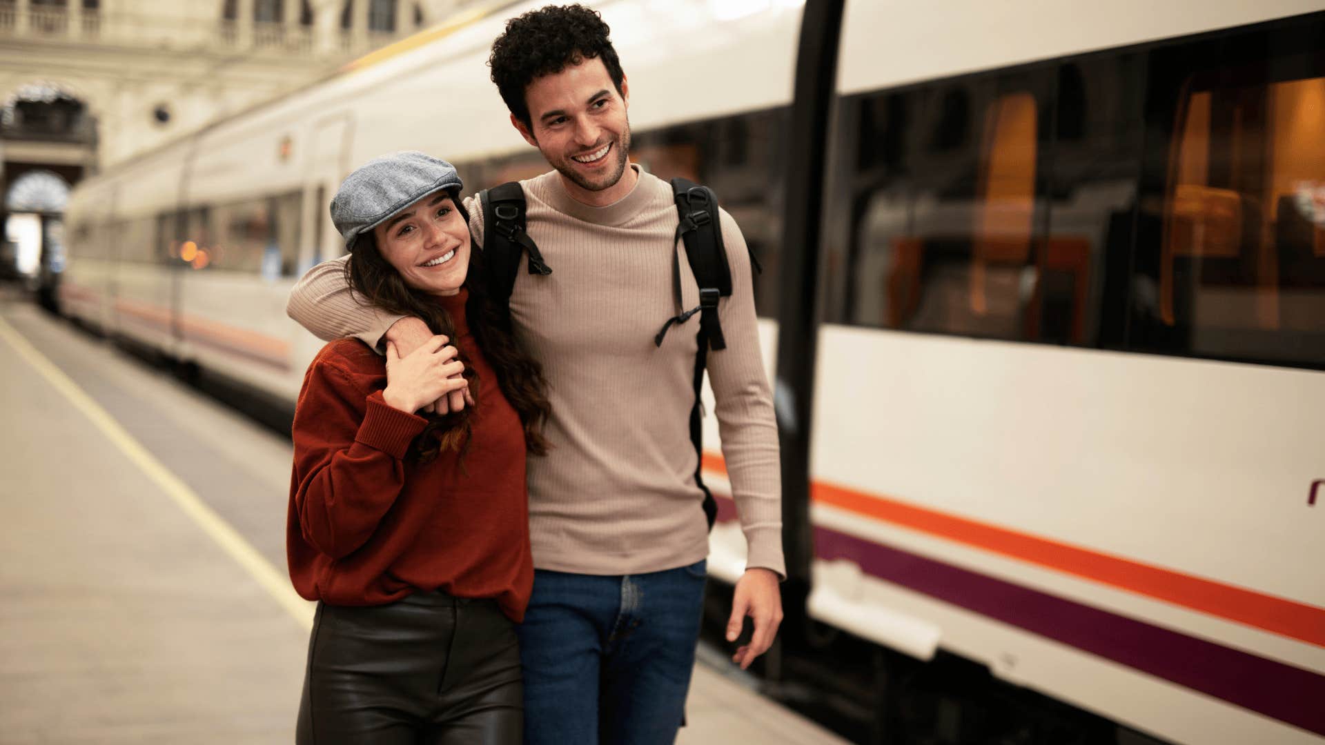 couple walks together by a train and know to let the little things go