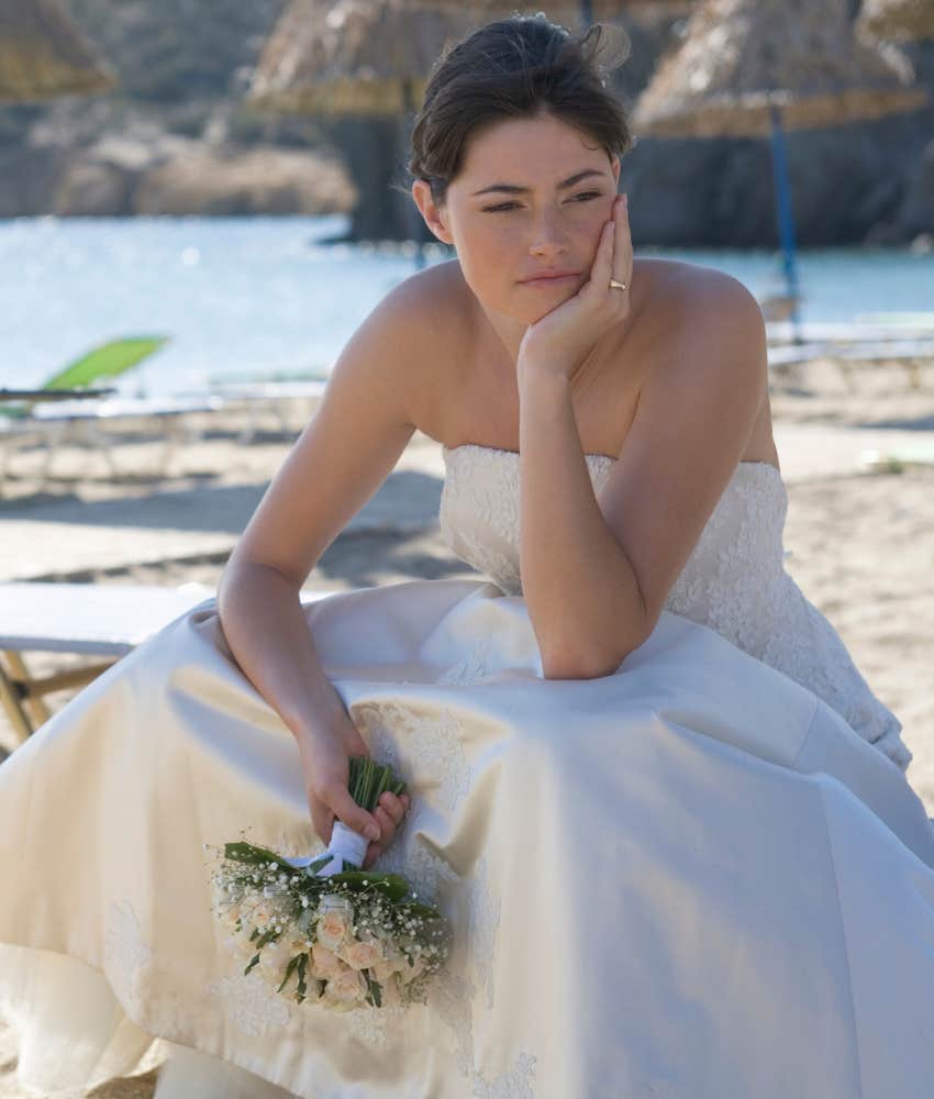 Bride looks sad.