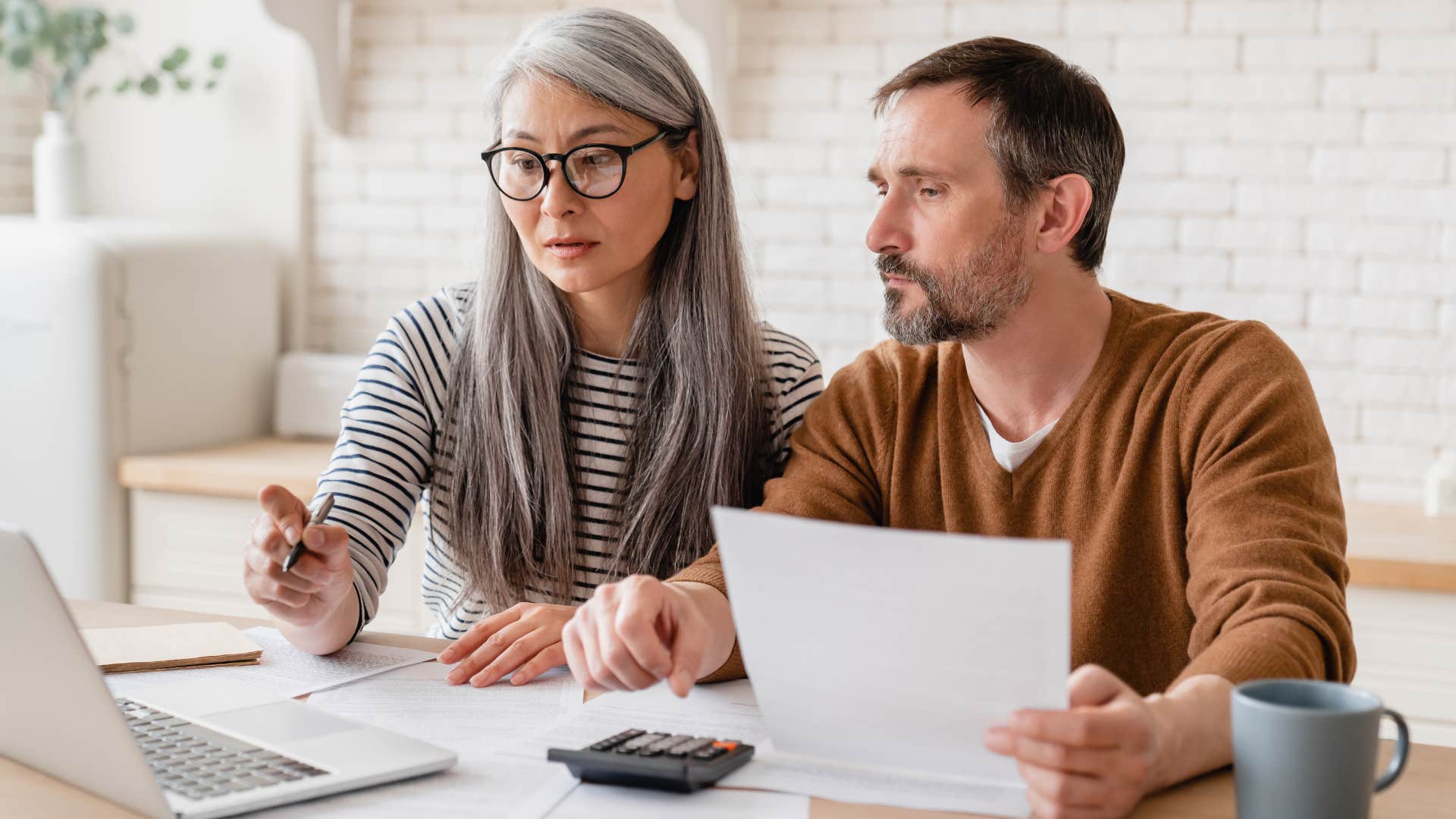 couple thinking investing is too risky