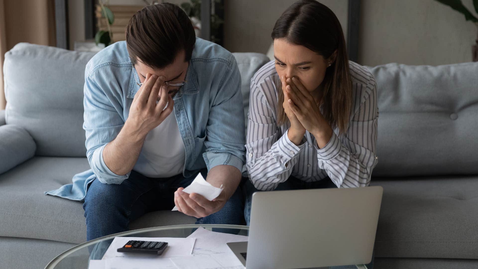 financially stressed couple thinking money doesnt grow on trees