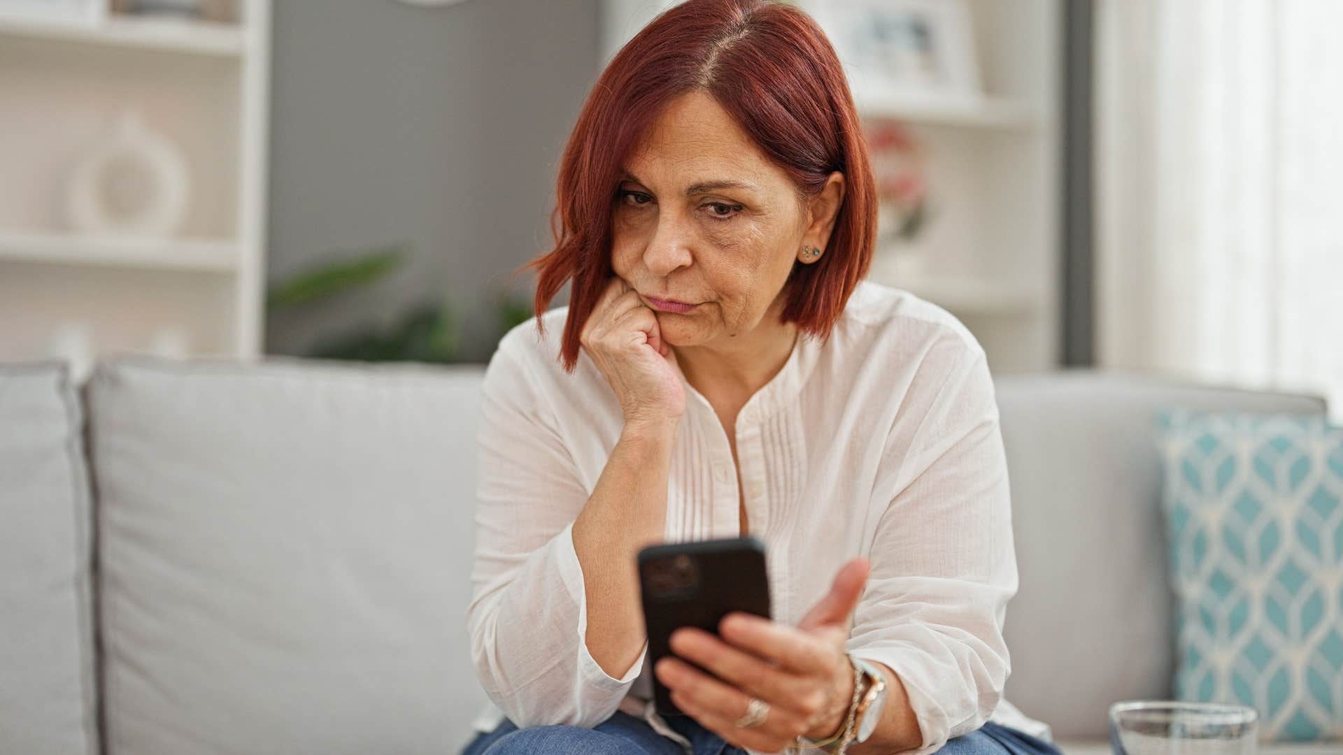 sad woman texting thanks for putting up with me to friends