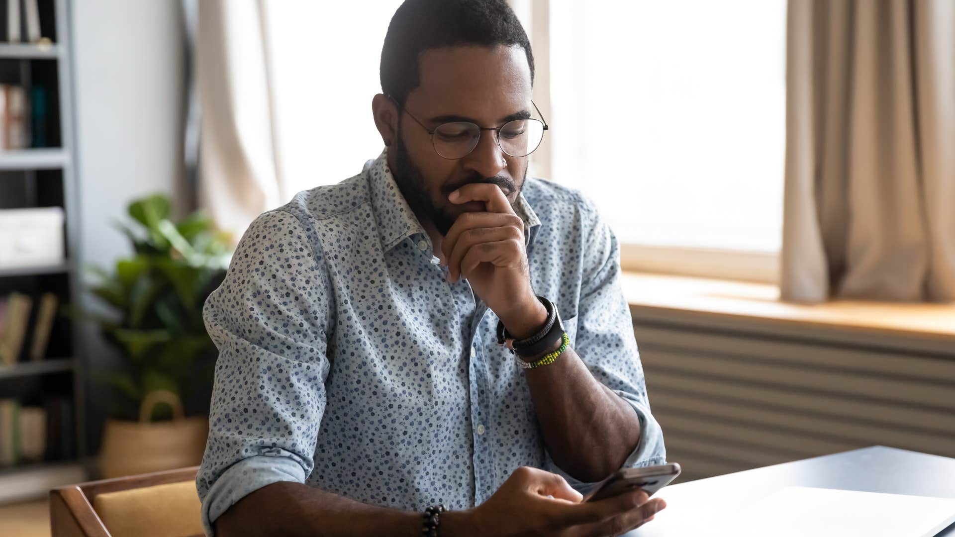 sad man texting you wouldn't understand to his friends