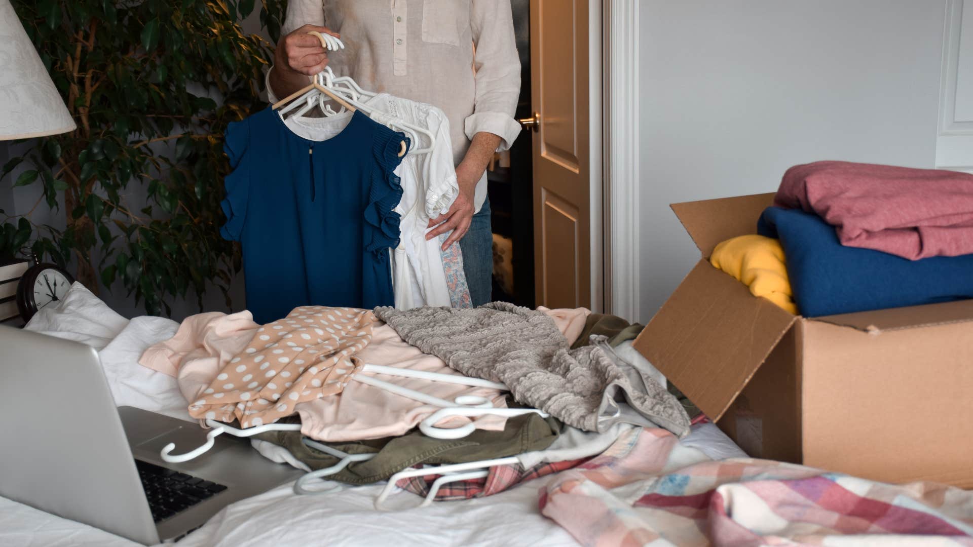 woman who will become super ager decluttering space
