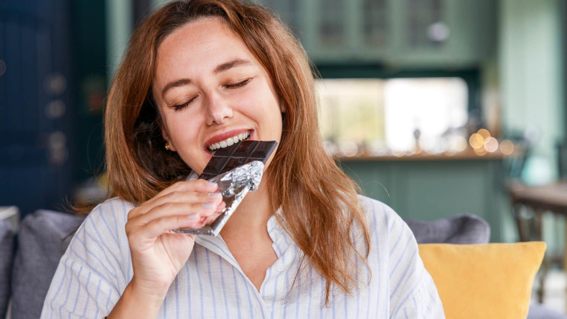 woman who will become super ager eating dark chocolate
