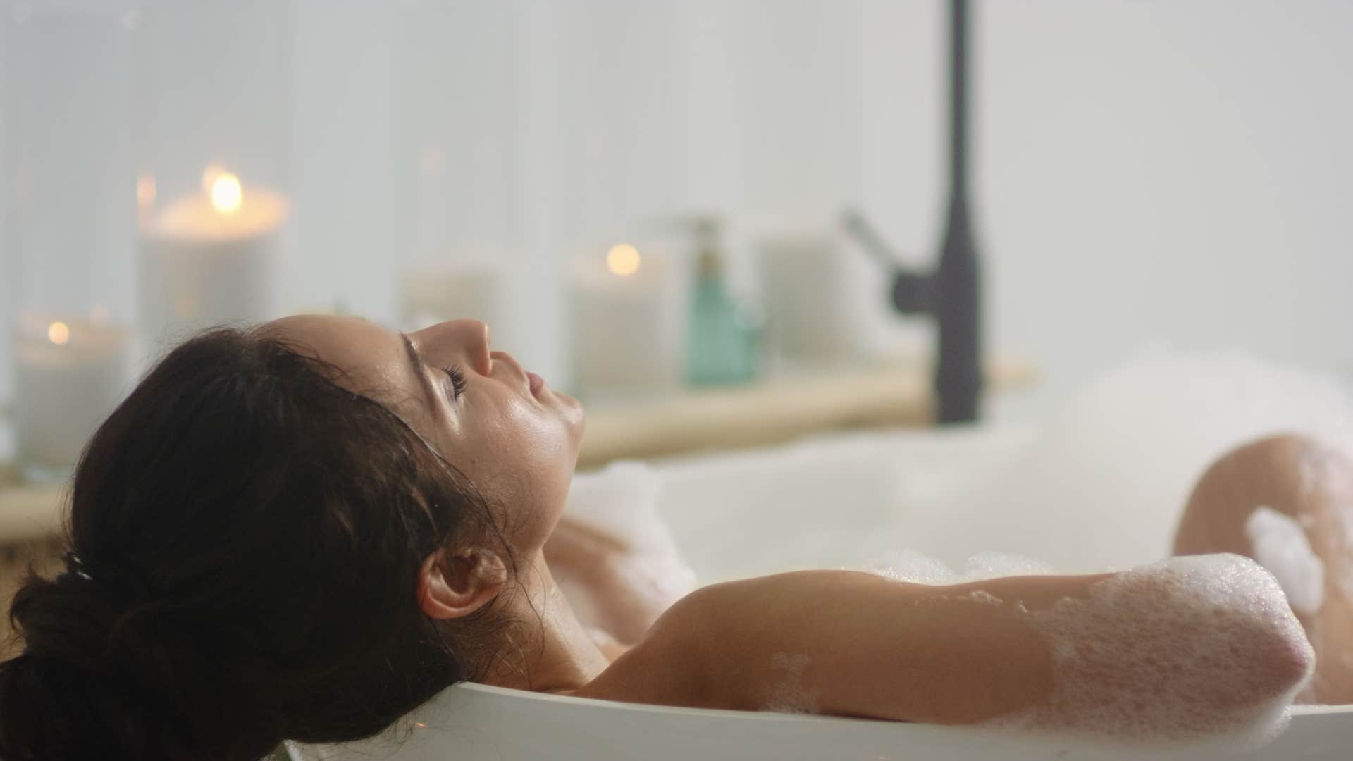 woman who will become super ager taking a bath