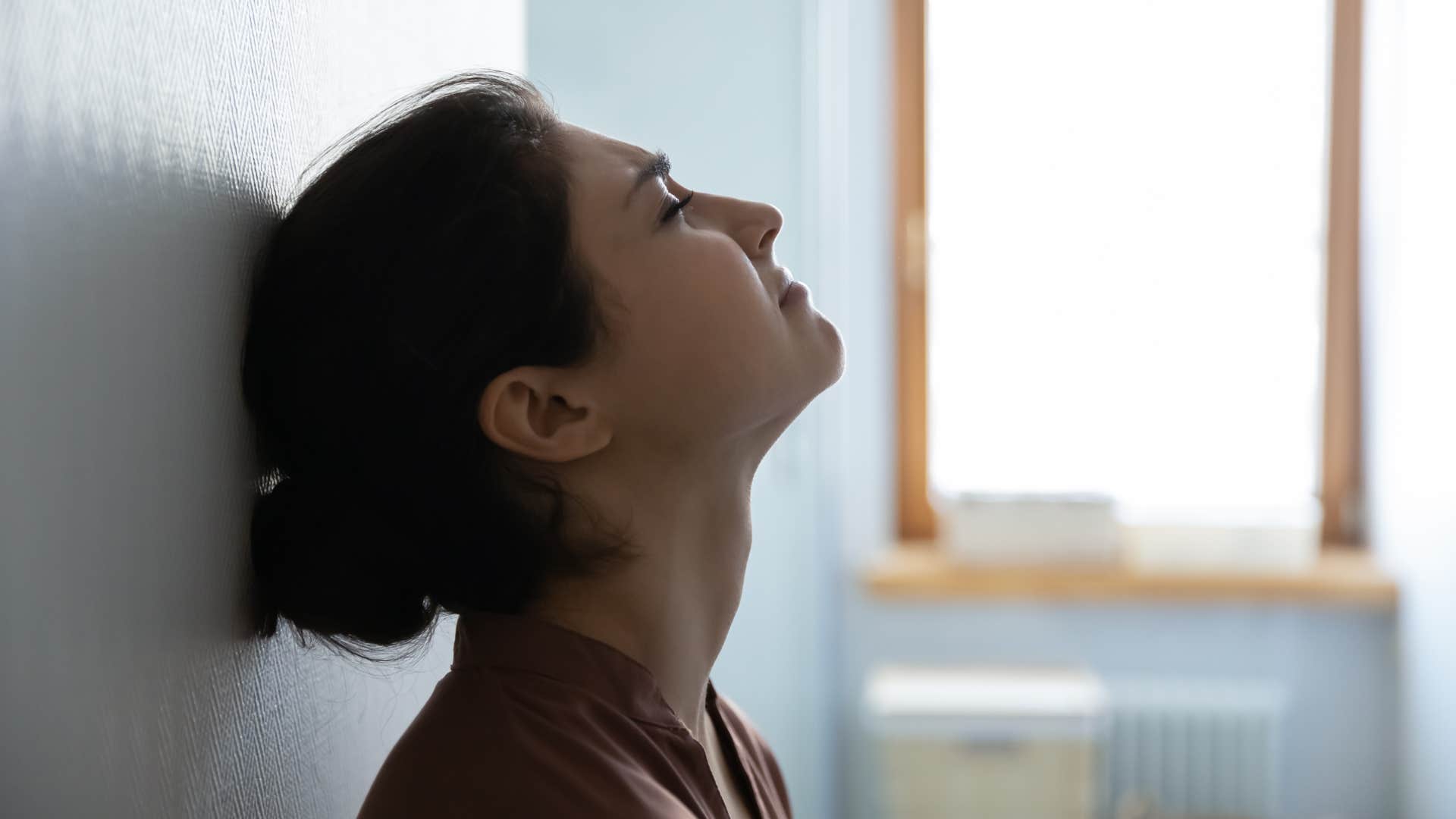 stressed woman thinking she will never get out of negative situation