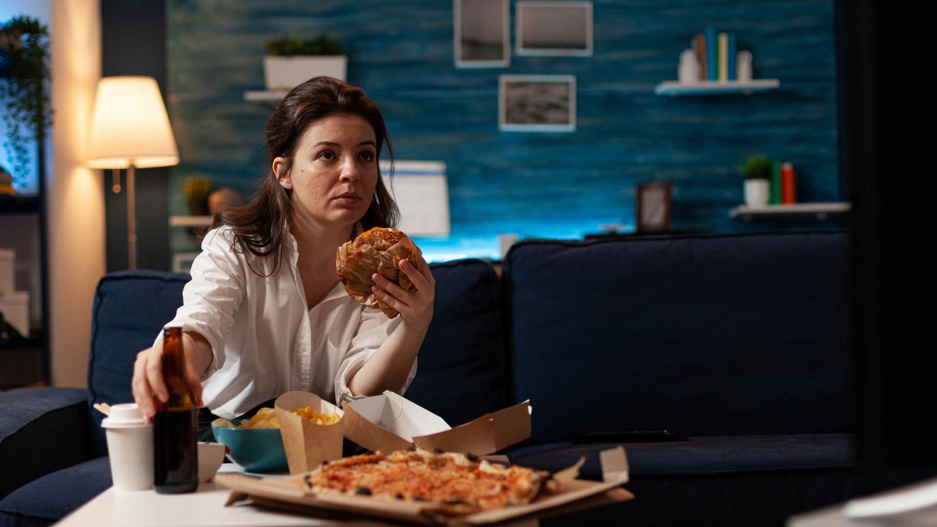 woman who doesn't feel acknowledged or cared for indulging in bad habits