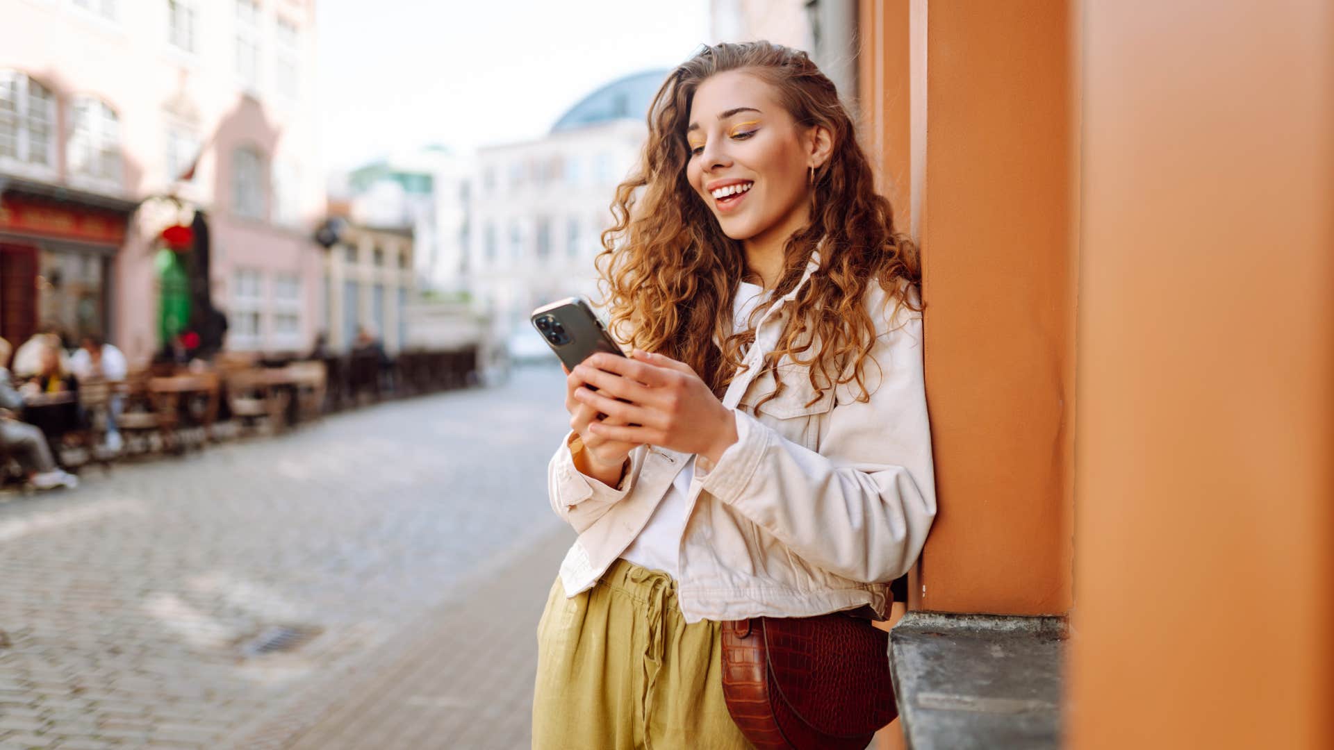 woman who looks more youthful calling someone