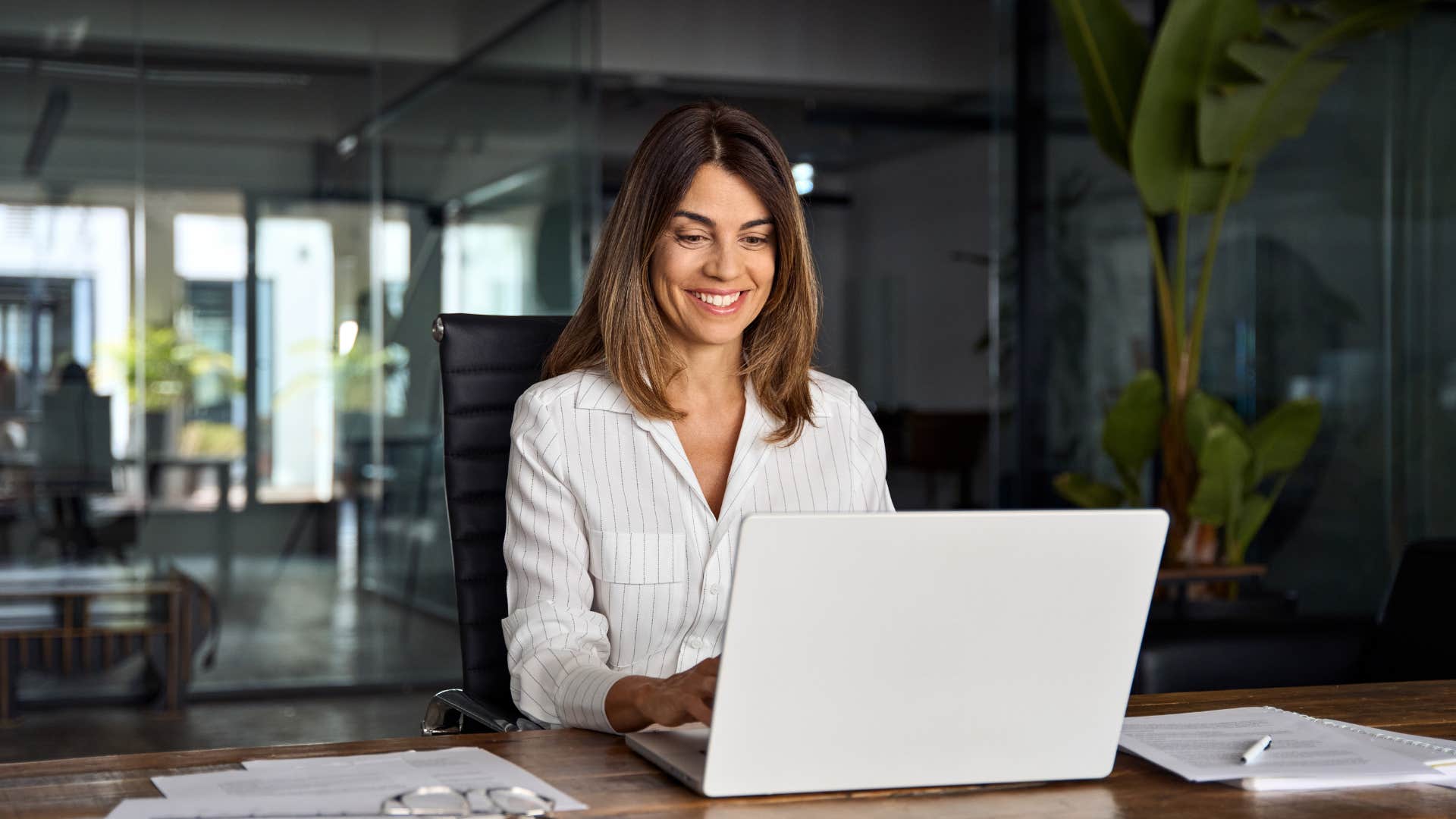 woman learning about finances on laptop