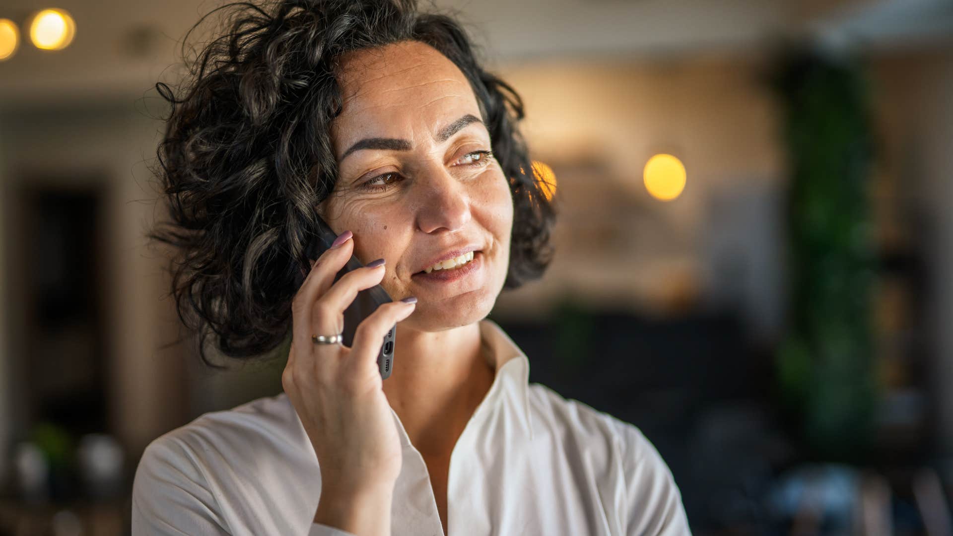 Woman who knows their priorities talking on the phone.