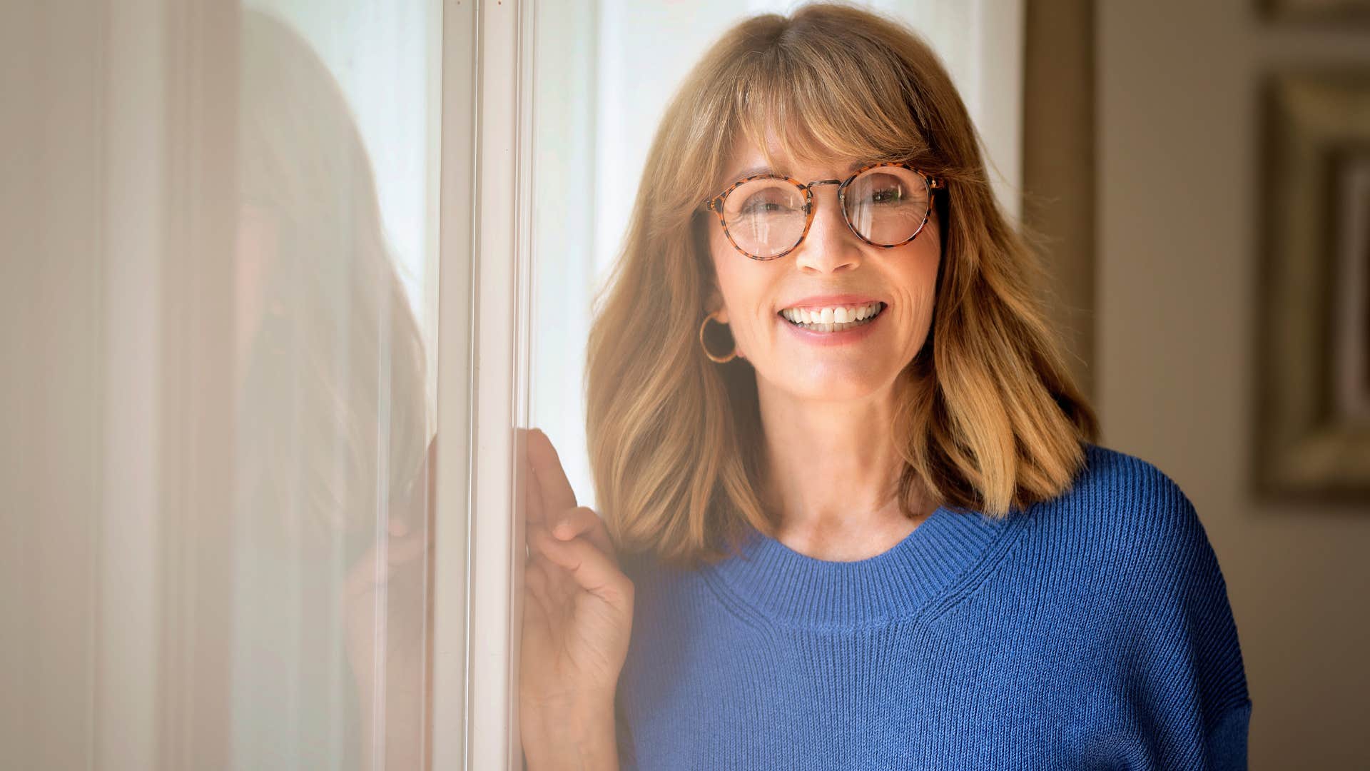 Woman who values authenticity smiling at the camera.