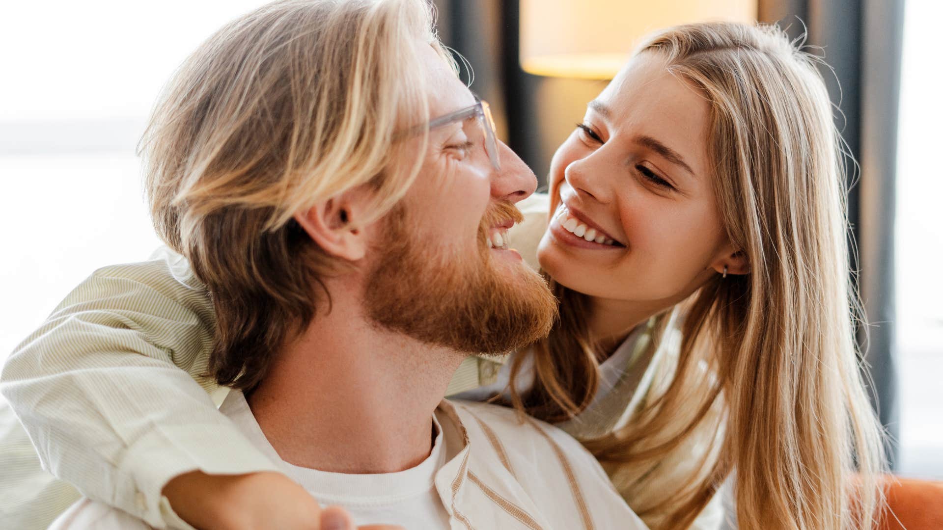 Woman who prefers deep connections smiling with her partner.