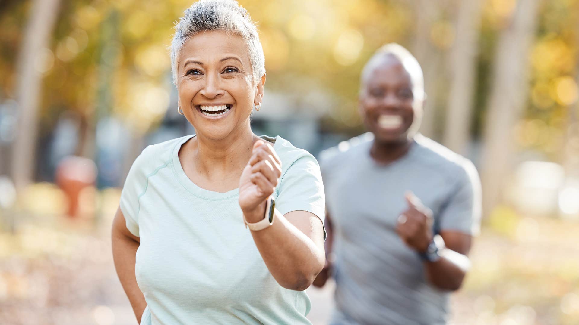 Woman who has fulfilling hobbies running outside.