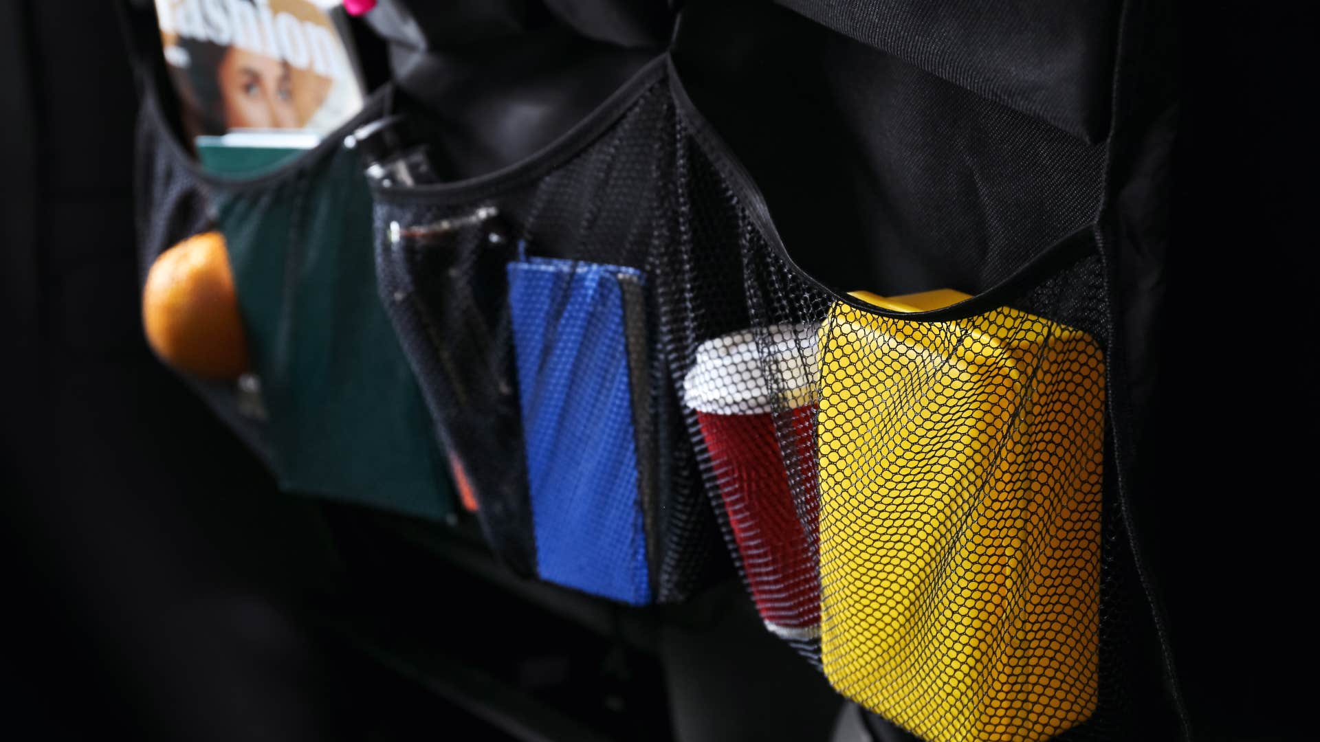 a close up of a storage organizer in a car