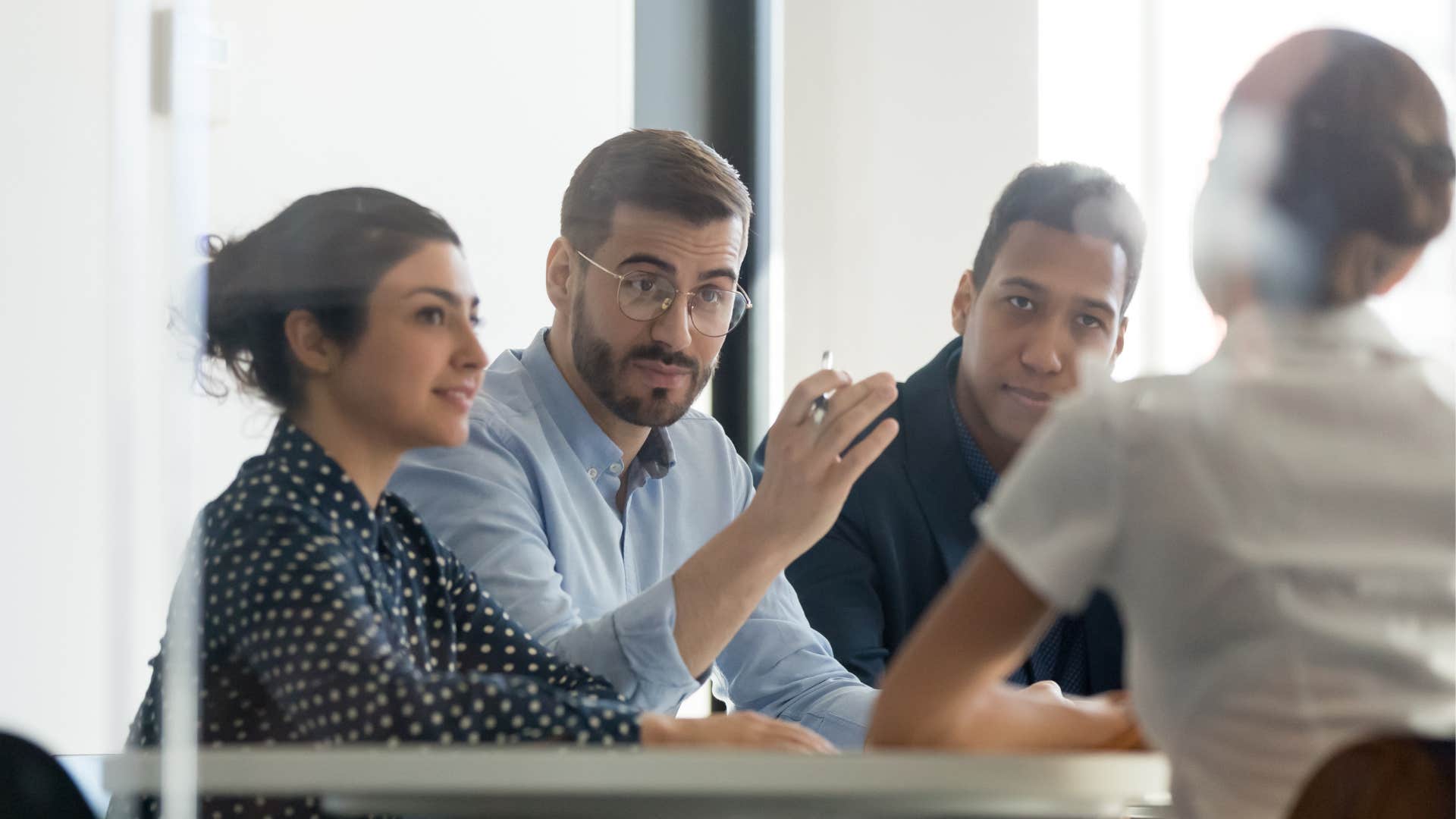 a man asks his colleague if he heard him right about an idea