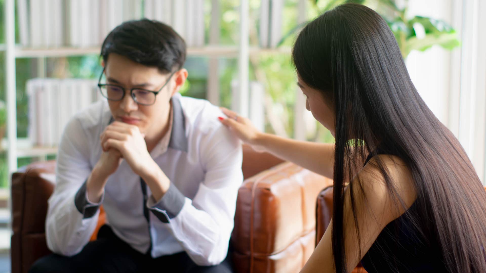 unemployed man telling woman hes in between jobs right now