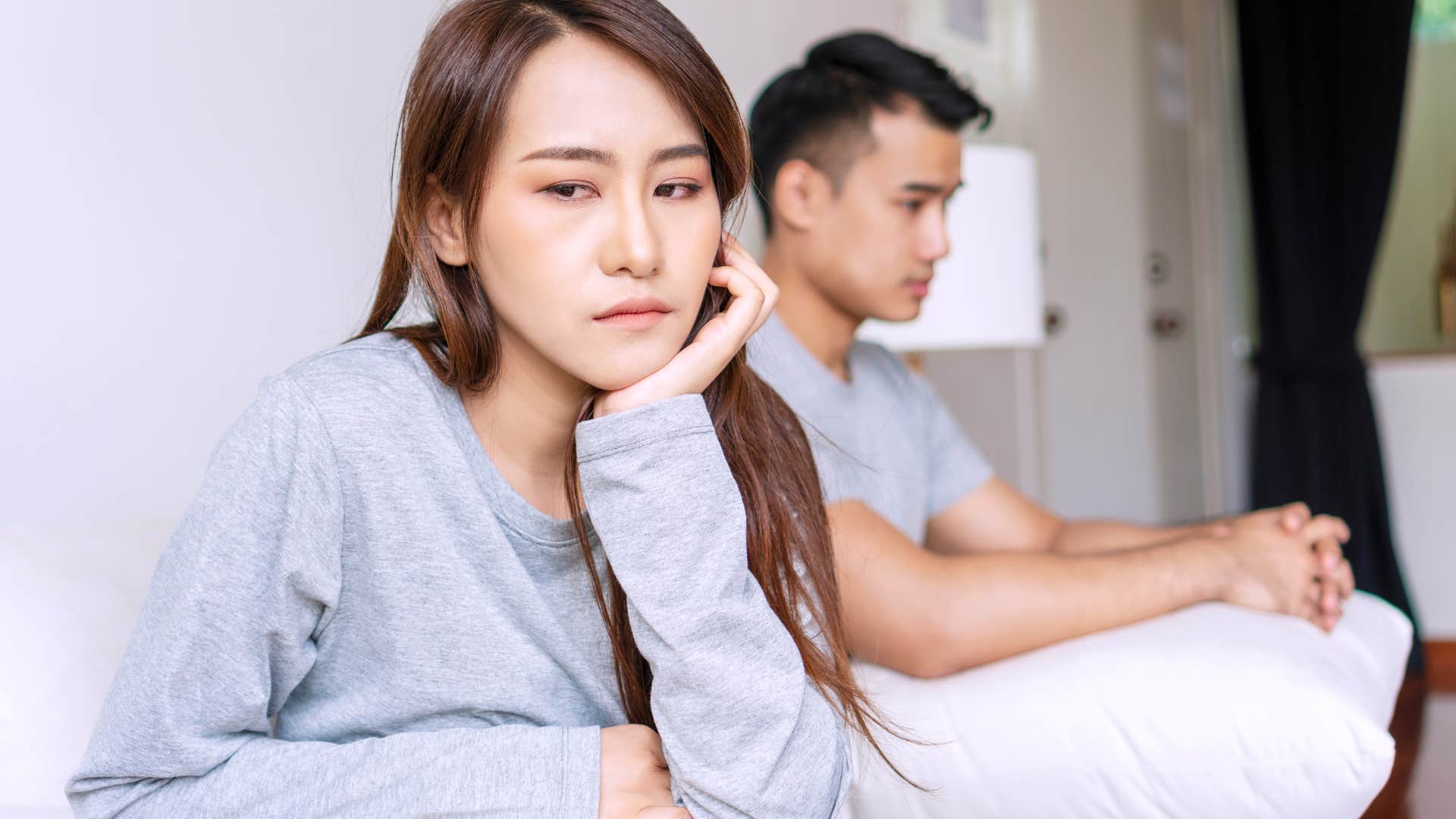 woman arguing with her husband who doesn't care anymore