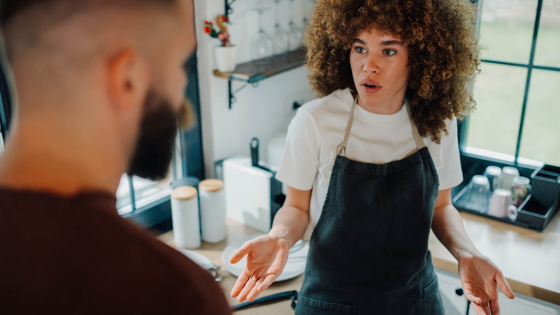 woman arguing that something is ridiculous with her boss