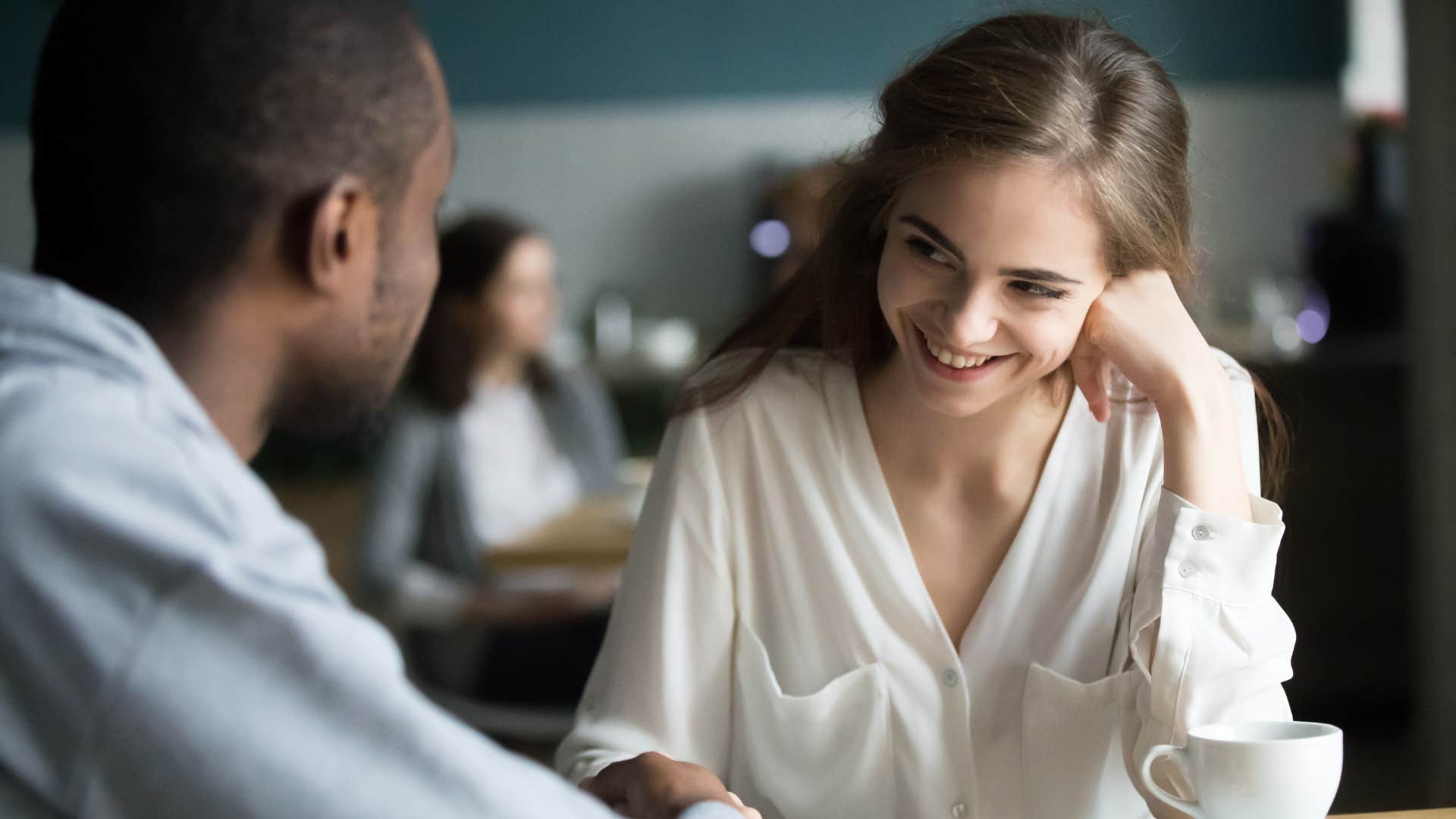 man dropping the phrase i miss you with woman he's into