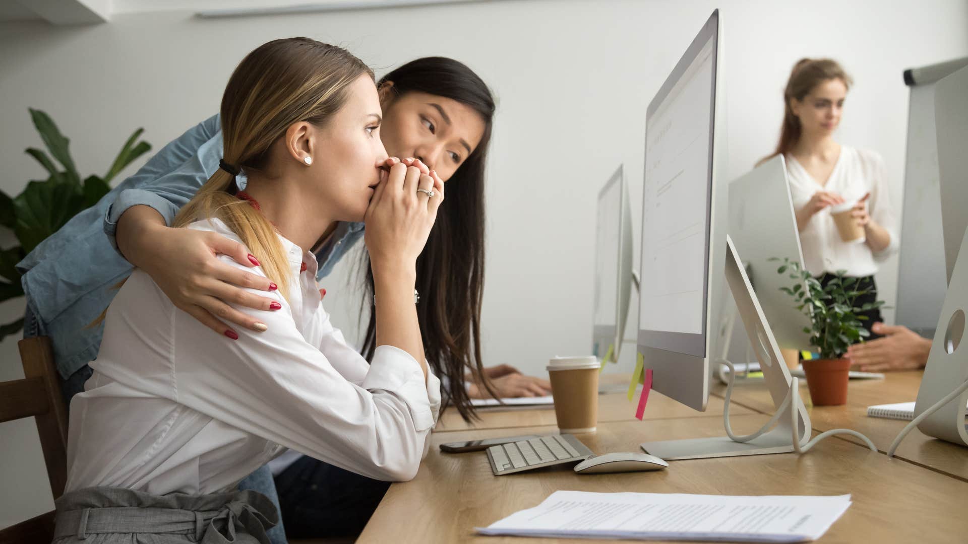 manager comforting lazy worker who says shes been in her inbox all day