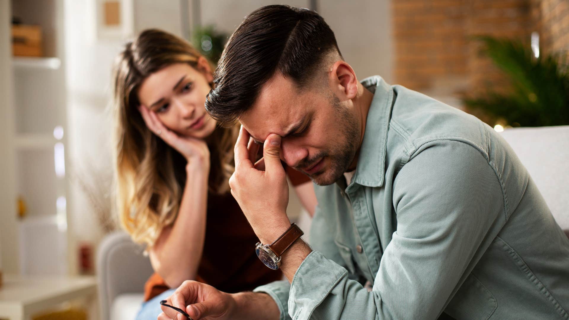 woman comforting man as she says take your time i'm not going anywhere