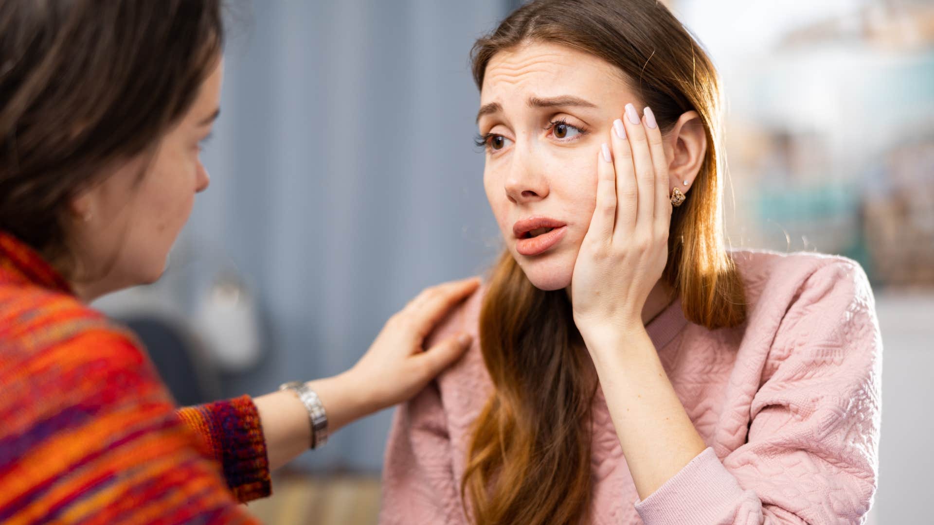 miserable upset woman telling friend I just don't feel like myself