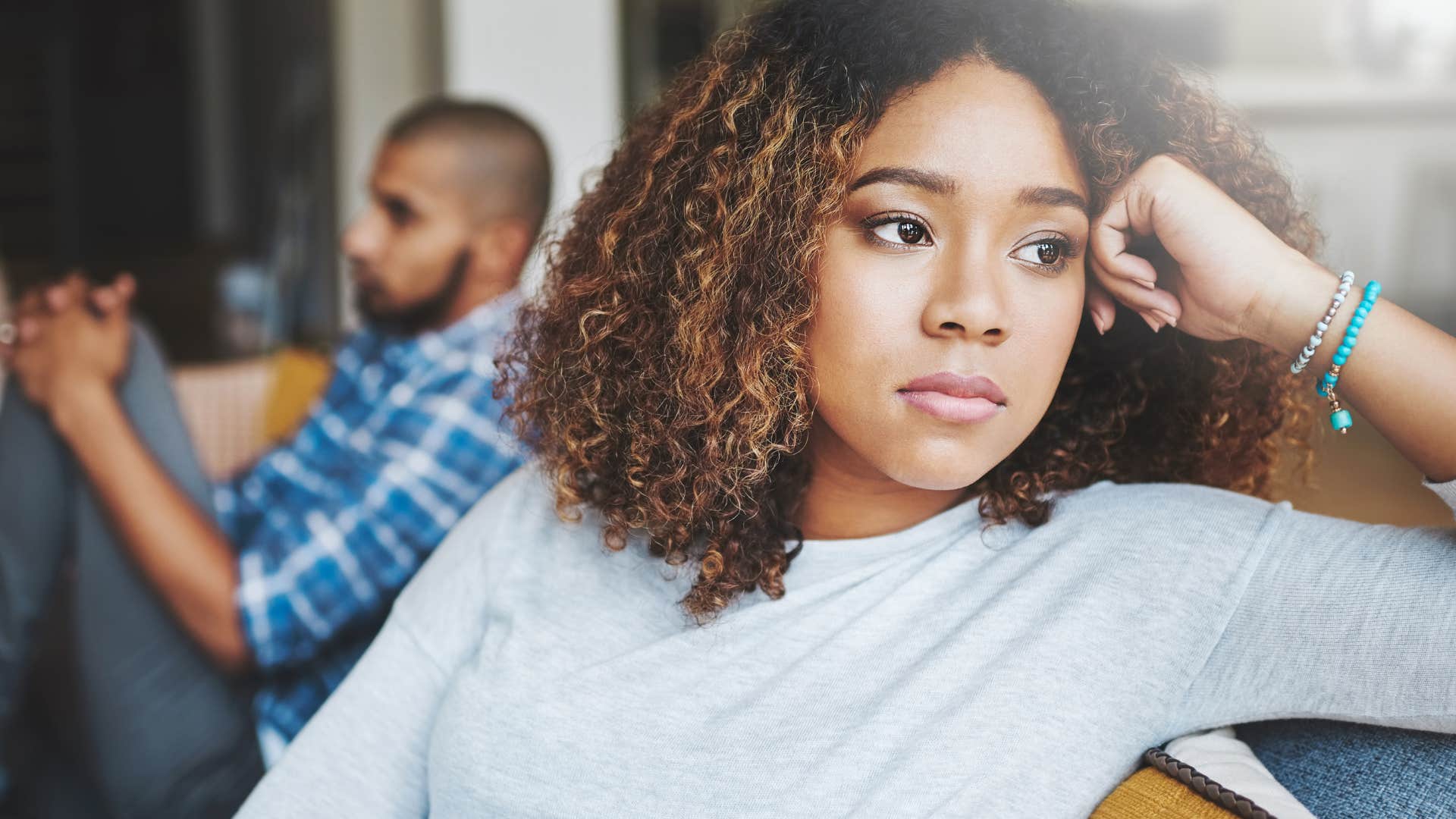 woman turned away from her partner saying I've just been dealing with a lot