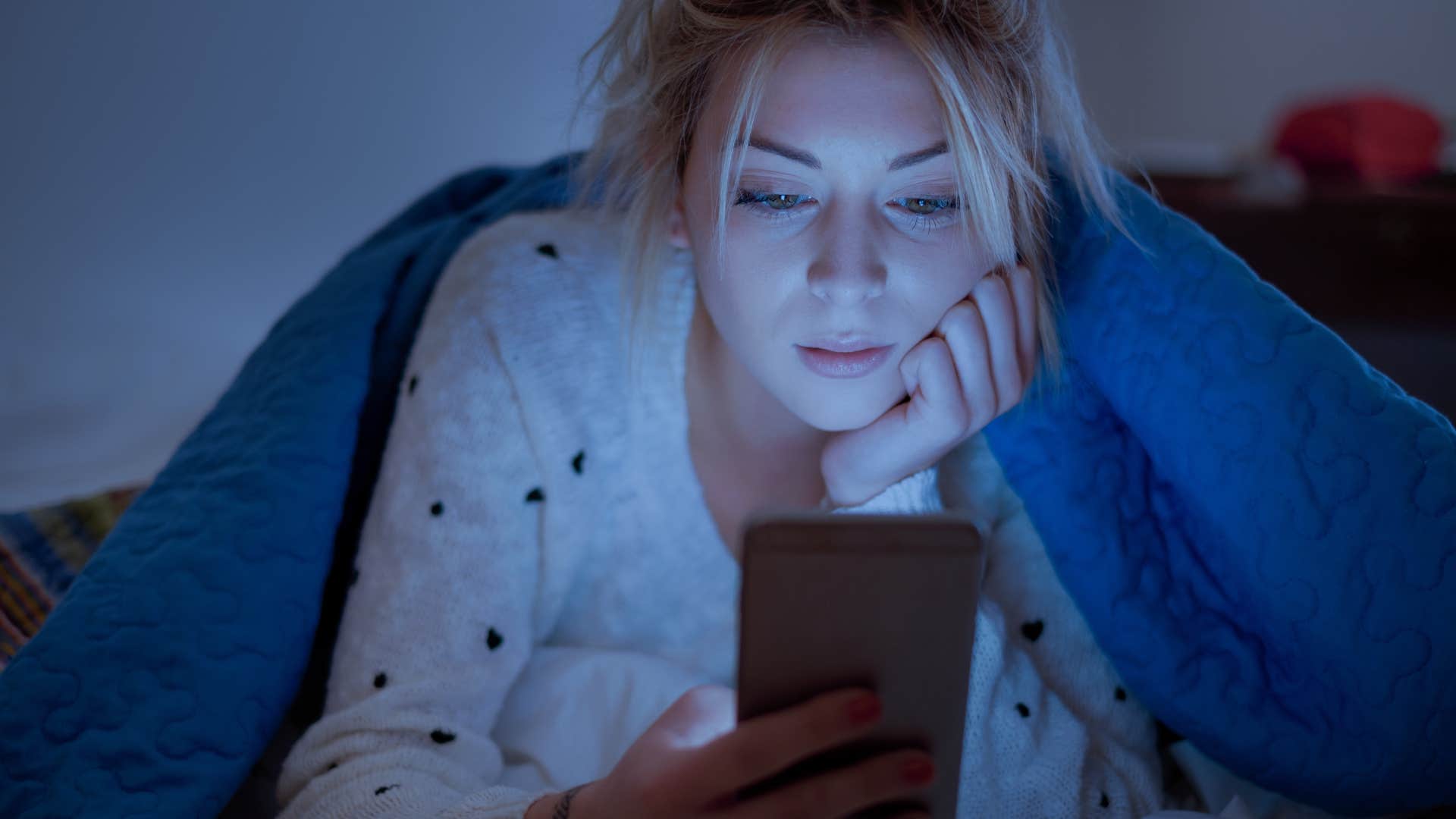 a woman is told by a man she is talking to that he is not very good at texting her