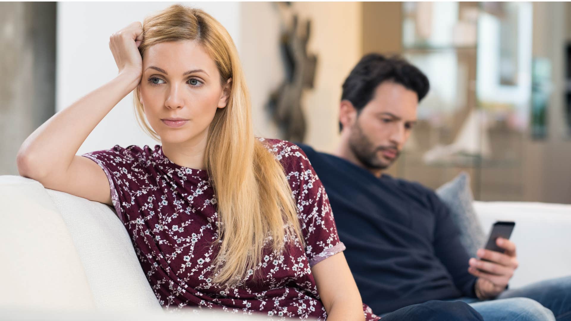 woman says everything feels stale as man ignores her and scrolls on her phone