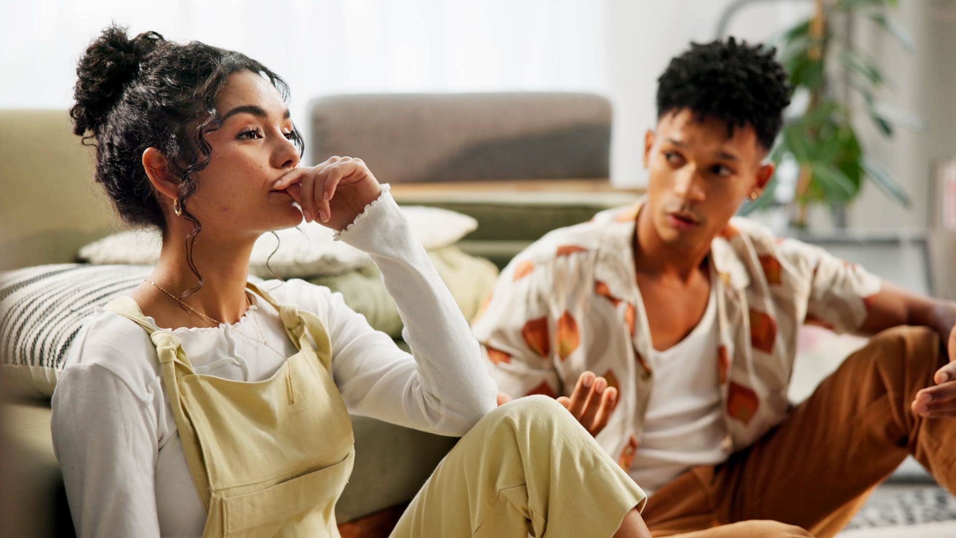 woman thinking i miss how things used to be as man looks at her confused