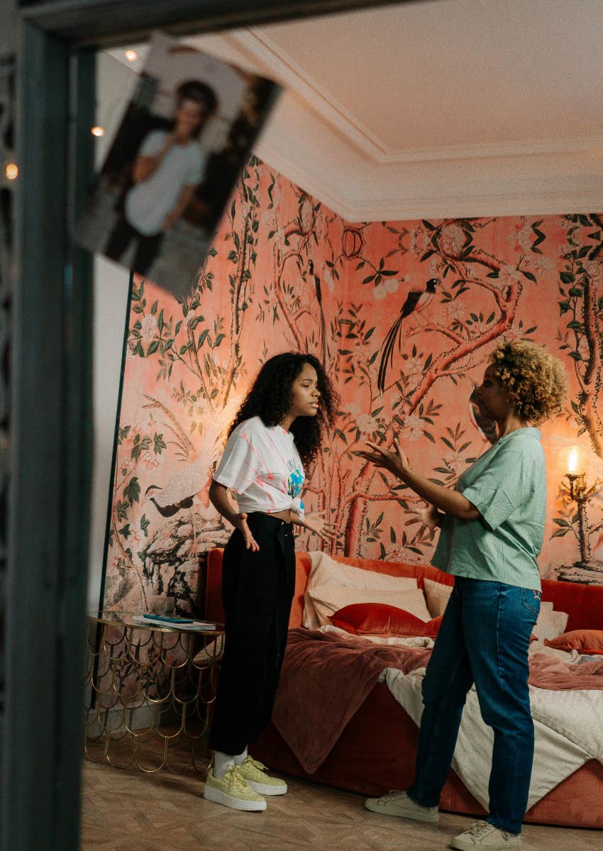 teen girl and her mom arguing over her messy room